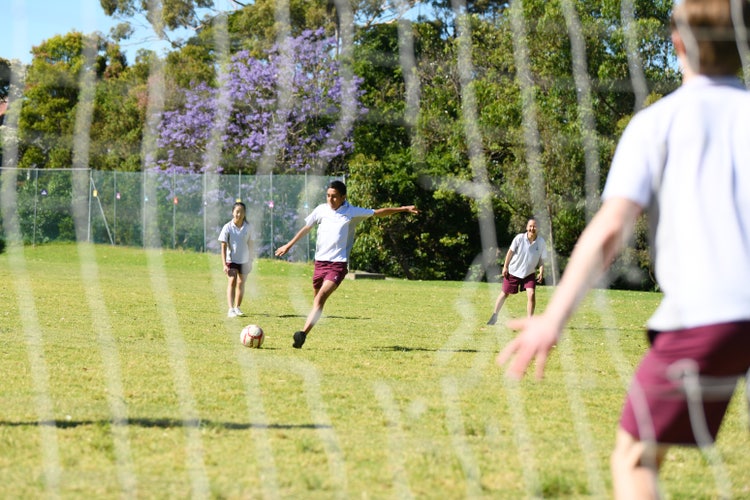 students playing soccor